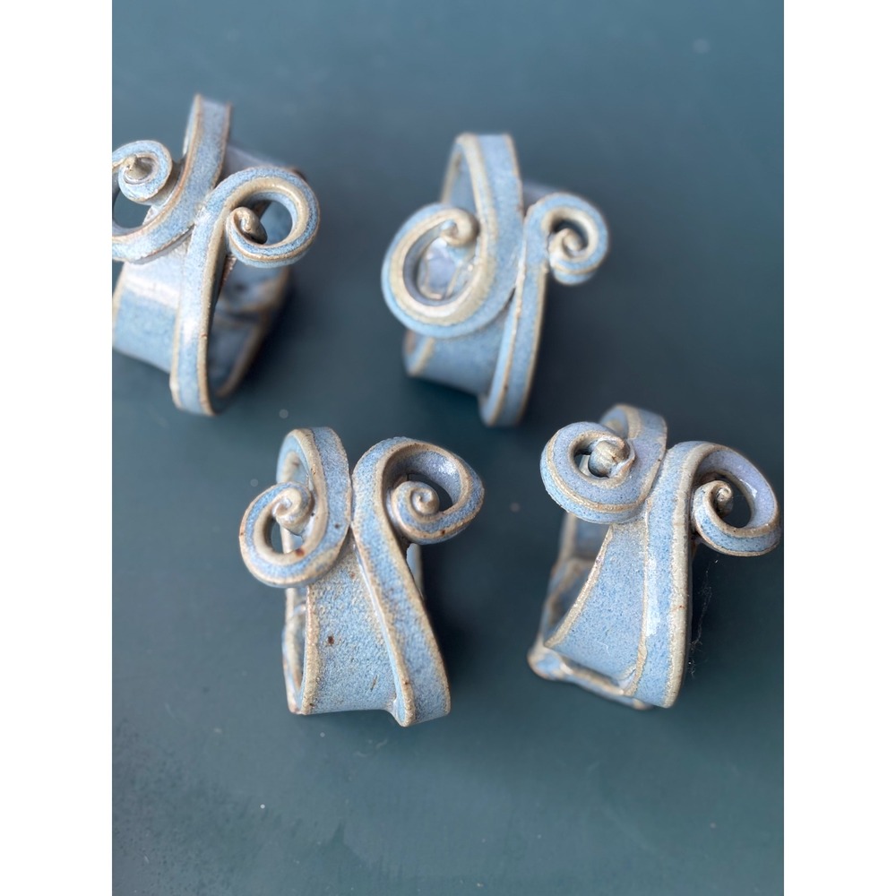 Set of 4 Artisan Studio Pottery Ceramic Scroll Napkin Rings Blue Glaze
